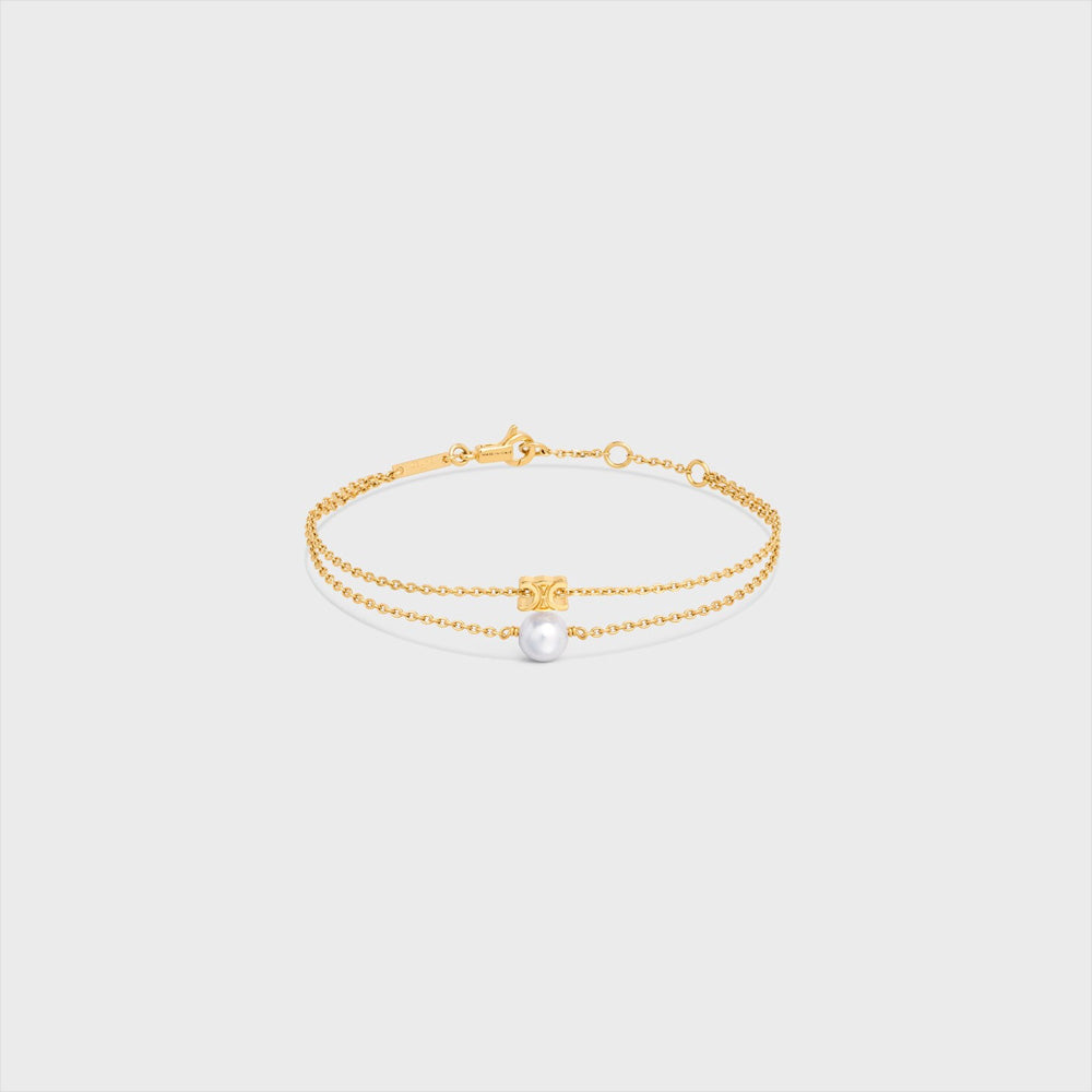 Celine Les Perles Celine Bracelet in Resin Pearl and Brass with Gold Finish (GOLD / IVORY)