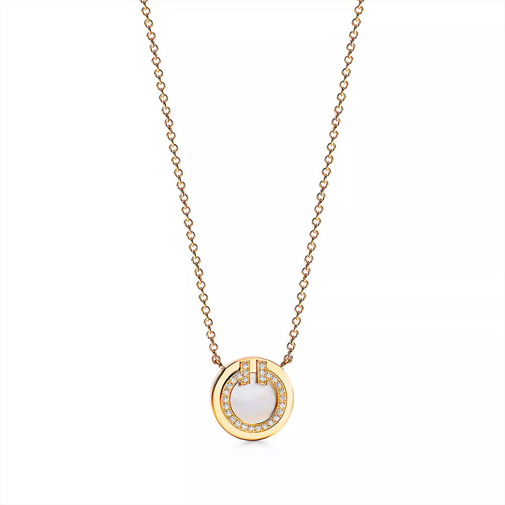 Tiffany &amp; Co. Tiffany T 18k 金鑽石和珍珠母圓形吊墜，16-18 英寸