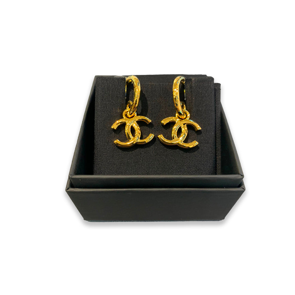 Hong Kong Stock - Chanel earrings with cc logo pendants in gold color