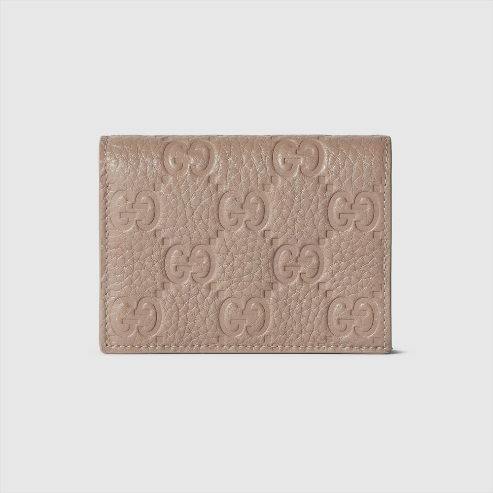Gucci GG Emblem 迷你錢包，設計小巧輕便，配有品牌雙G標誌。