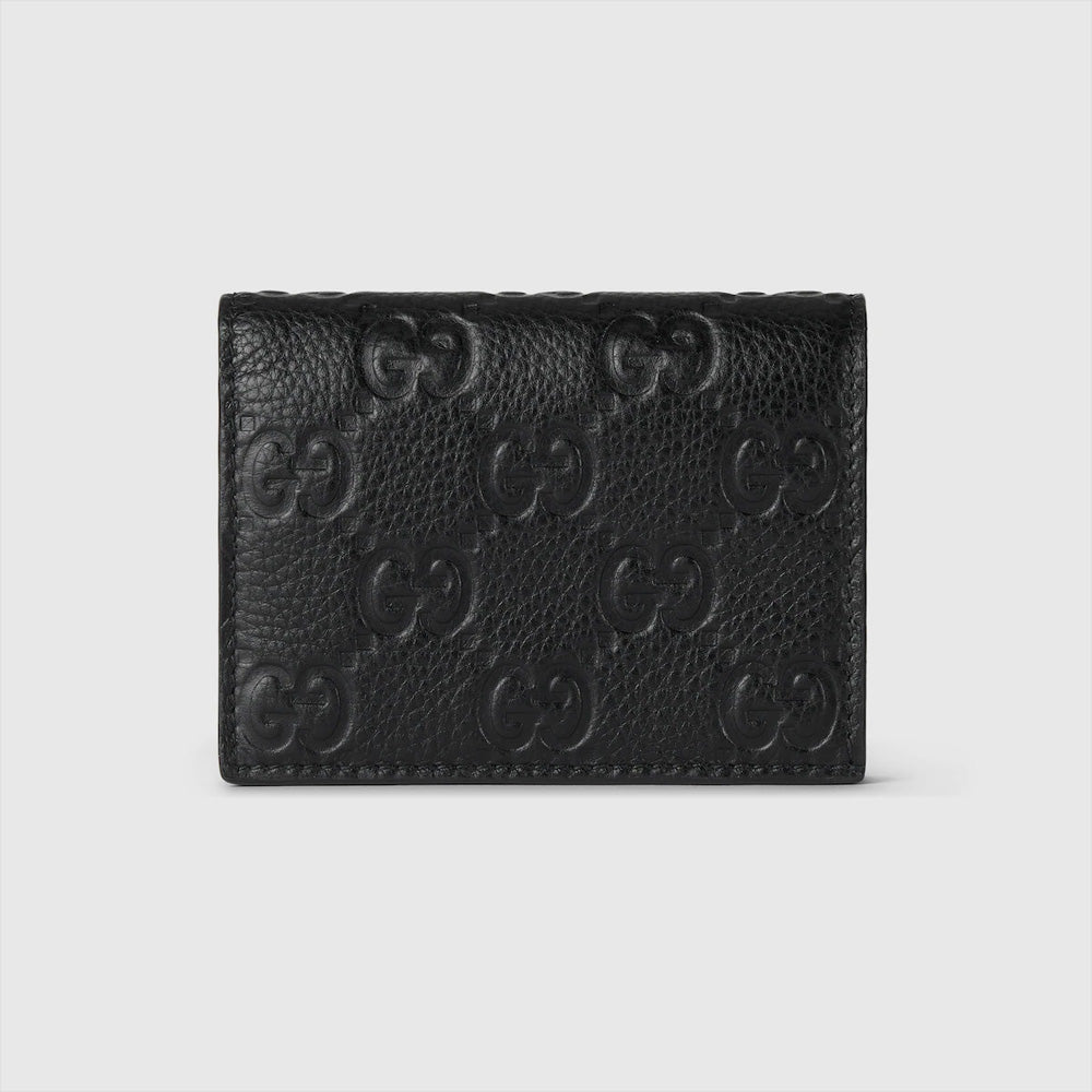Gucci GG Emblem 迷你錢包，適合日常使用，時尚與功能兼備。