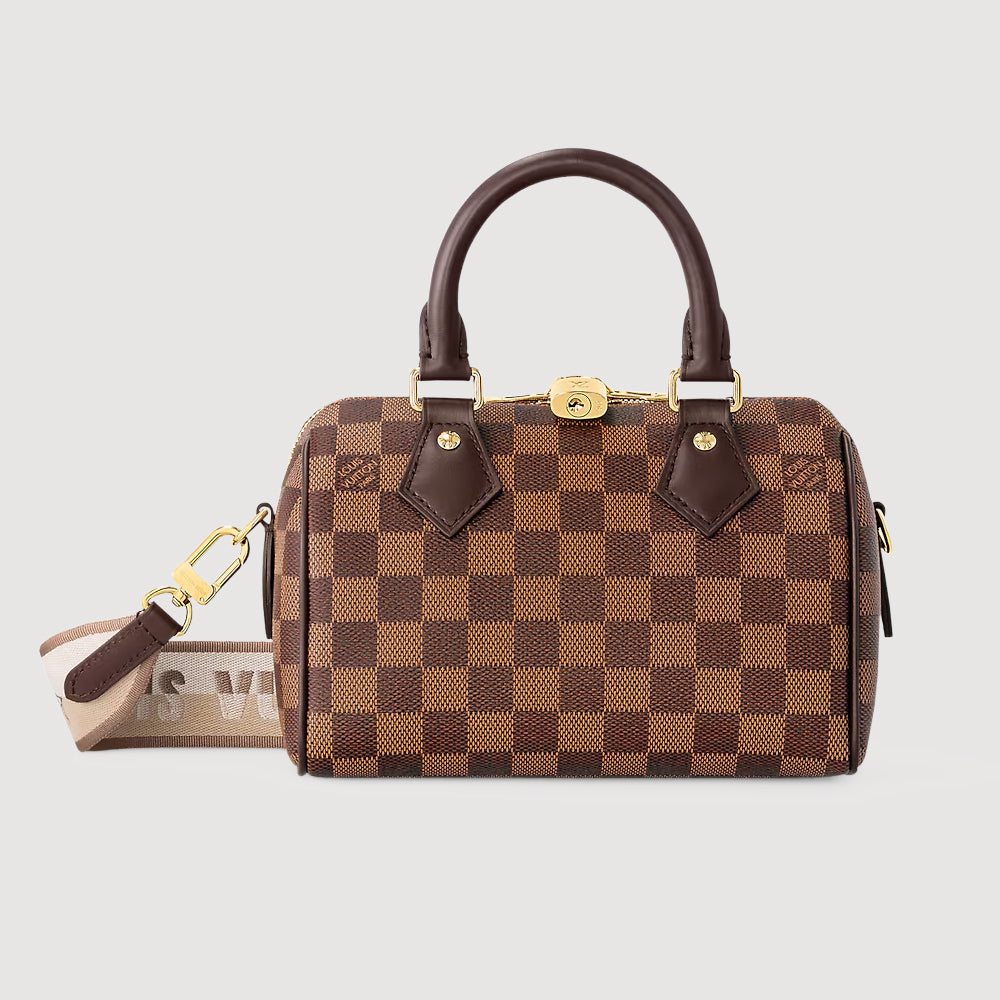 Louis Vuitton Speedy Bandoulière 20，經典棋盤格圖案，配有可調節肩帶，時尚與功能性結合。