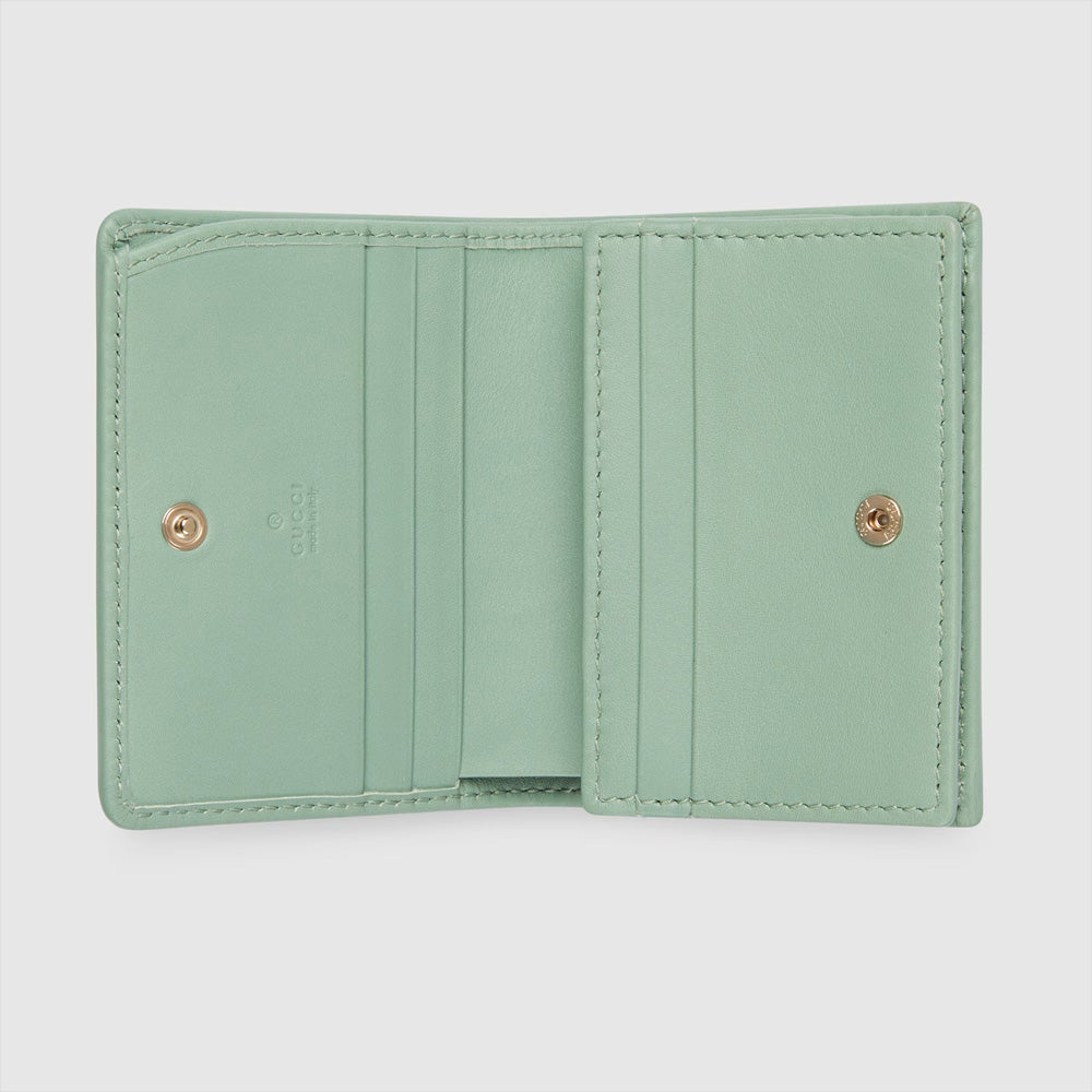 Gucci GG Emblem 迷你錢包，設計小巧輕便，配有品牌雙G標誌。