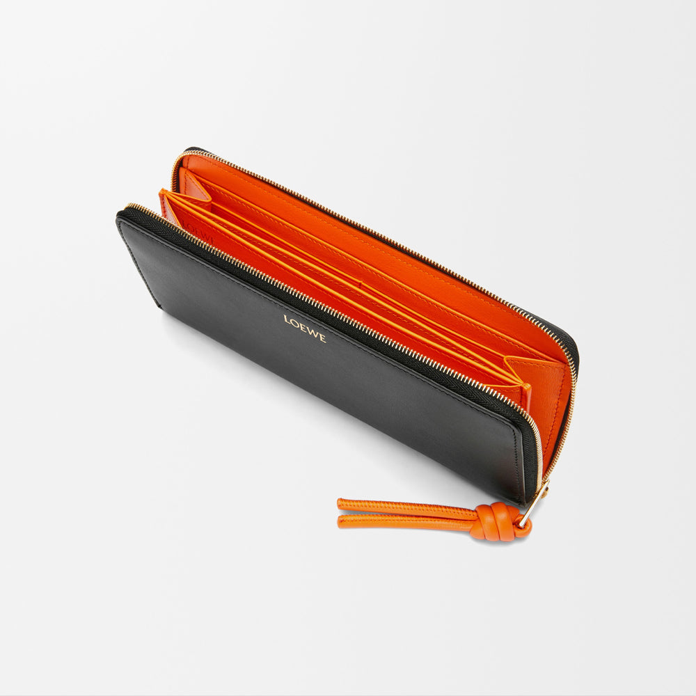 Loewe Knot zip around wallet in shiny nappa calfskin (Black/Bright Orange)