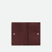 Bottega Veneta Intrecciato Medium Bi-Fold 錢包，經典編織設計，配有 L 型拉鏈，展現時尚與實用性。