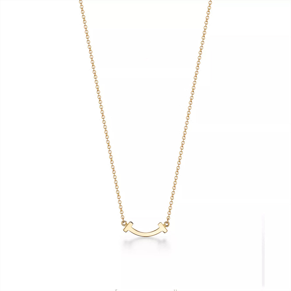 Tiffany & Co. 18K 金 Tiffany T 微笑吊墜，鑲嵌圓形明亮式切割鑽石