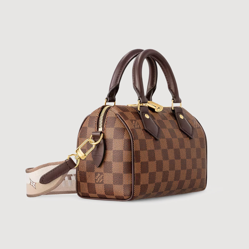 Louis Vuitton Speedy Bandoulière 20，經典棋盤格圖案，配有可調節肩帶，時尚與功能性結合。