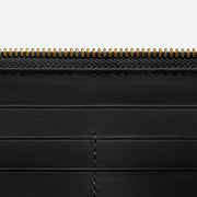 Bottega Veneta Intrecciato 長款錢包，備有硬幣夾層，展現實用與編織工藝美感。