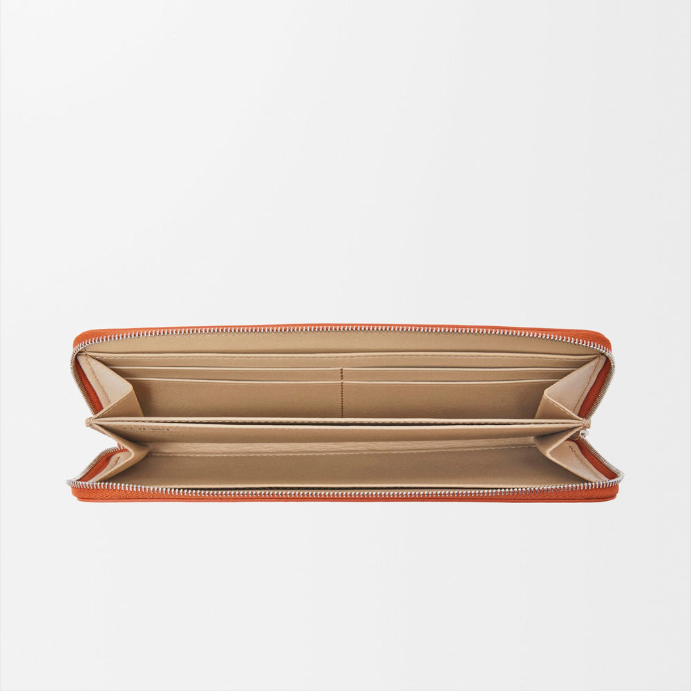 Loewe Knot zip around wallet in shiny nappa calfskin (Maple/Papercraft)