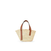 Loewe Small Basket Bag – 採用天然 Raffia 材質與小牛皮細節，品牌標誌性編織設計，輕便且時尚。