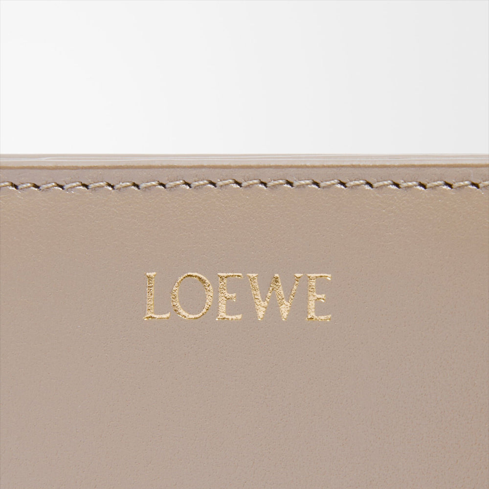 Loewe Knot compact wallet in shiny nappa calfskin (Sand/Tropical Green)