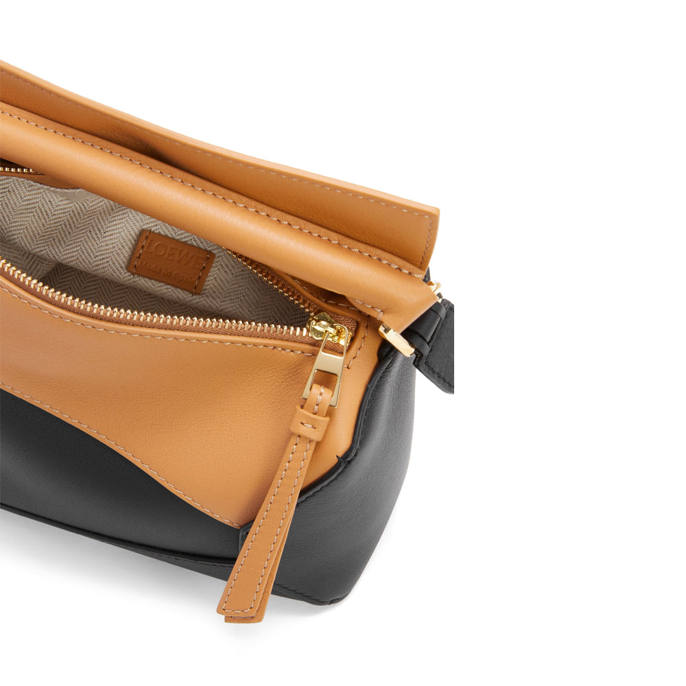 Loewe Mini Puzzle bag in classic calfskin (Warm Desert/Black)