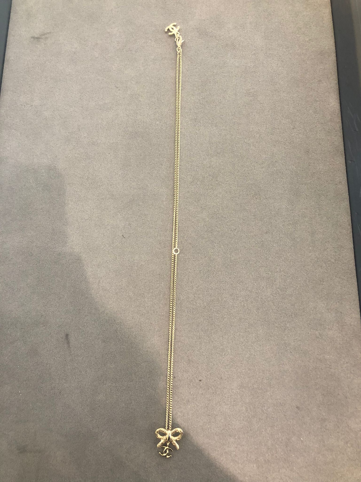 Hong Kong Stock - Chanel 25K Bow and Dangling Logo Necklace in SHW ABG556