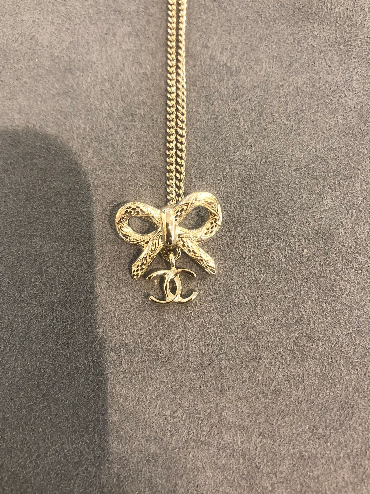 Hong Kong Stock - Chanel 25K Bow and Dangling Logo Necklace in SHW ABG556