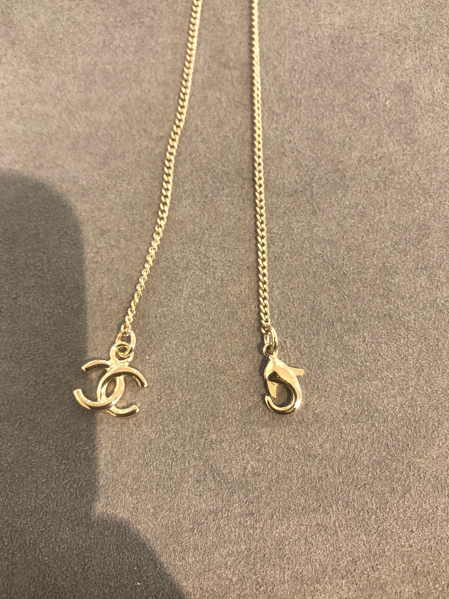 Hong Kong Stock - Chanel 25K Bow and Dangling Logo Necklace in SHW ABG556